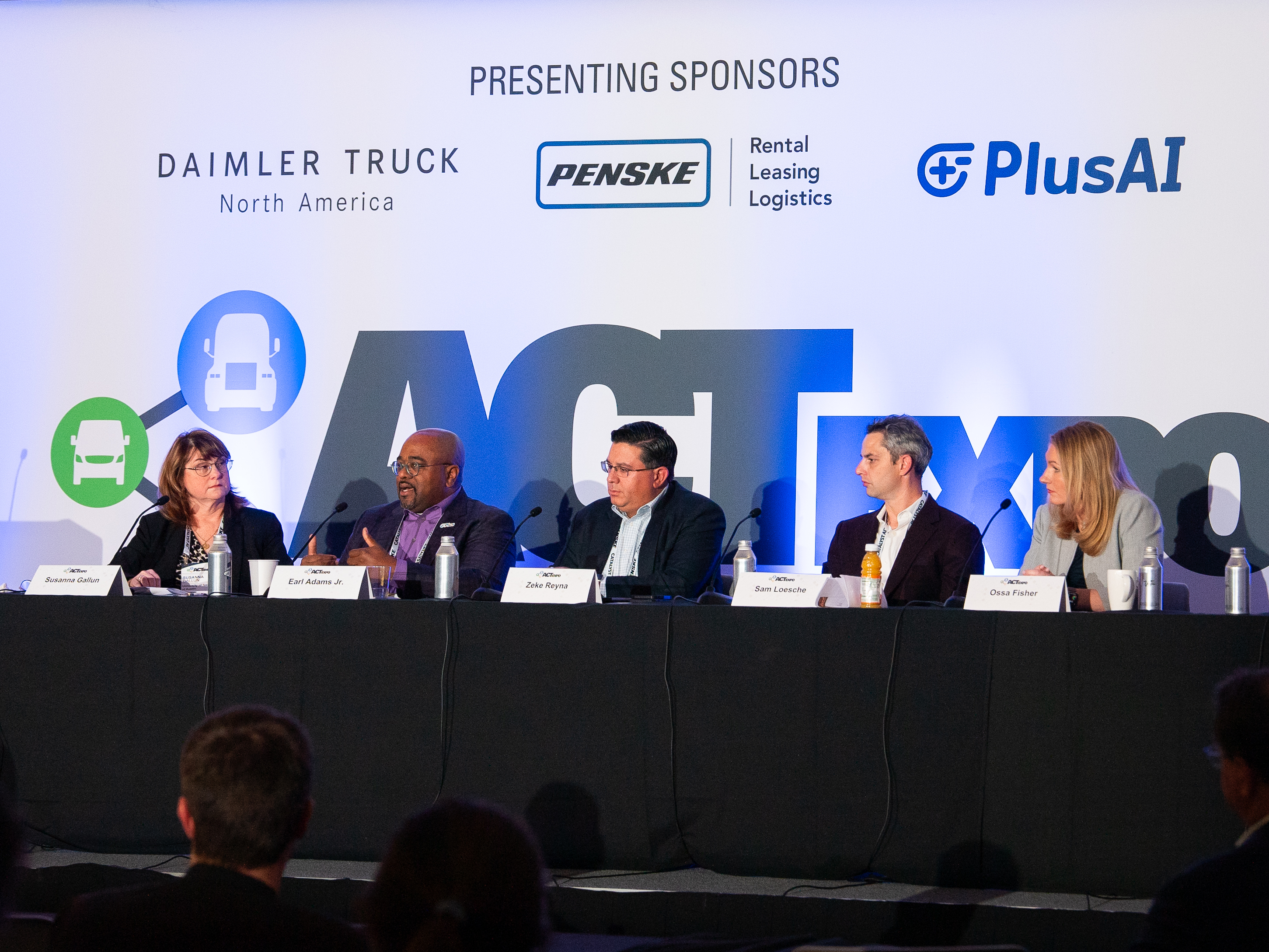 Earl Adams Jr. speaking on the Mapping the Future panel at ACT Expo 2026, with PlusAI listed as a presenting sponsor